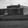 A black and white image of the brick Parkridge building from 1945